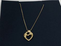 "Description: A Beautiful Sterling Silver Mother-Child Necklace. Pendant & Chain are made of Gold Plated Solid 925 Sterling Silver, both are stamped with 925 for Authenticity. Mother's Day is just around the corner and it's time to find the perfect gift for all the wonderful Moms in your life. Gift her a heart shaped pendant which is a true classic, highlighting a mother (mom) and Childs unique bond. Crafted from sleek 925 sterling silver with Gold Plating. This pendant is both of unsurpasse Mother's Day Heart Pendant Necklace Stamped 925, Gold Heart-shaped Jewelry Stamped 925, Gold Heart Jewelry Stamped 925, Stamped 925 Open Heart Jewelry For Mother's Day, Heart Shaped Pendant, Mother Child, Kids Necklace, Heart Shape Pendant, Mother And Child