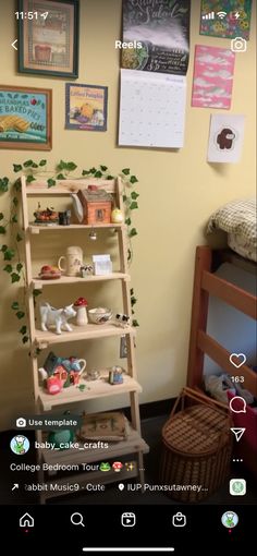 a wooden shelf filled with lots of items next to a wall covered in pictures and photos