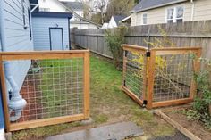 two fenced in backyards next to each other