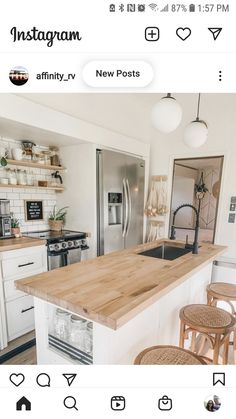 the instagram page shows an image of a kitchen with white cabinets and wood counter tops