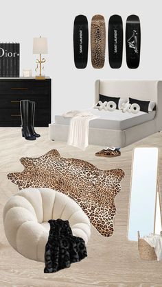 the bedroom is decorated in black and white with leopard print rugs, bedding, and accessories