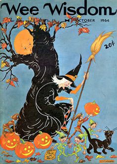 an old halloween magazine cover with a witch and her black cat on it's back