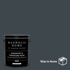 a black paint can with the words magnolia home painted on it