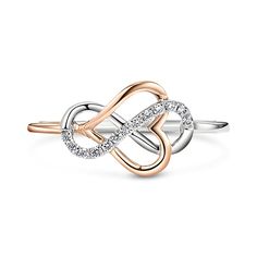 Whether you are looking for something special for your mother or wife, this infinity heart ring is a lovely way to show her how much you treasure her. The infinity ring was designed as a symbol of endless and enduring love, memories, and devotion that is unbreakable. The design of this ring combines the beating heart, meaning that my heart only beats for you. This ring will go perfectly with almost everything in her wardrobe and will put a smile on her face every time she wears it.Carat Weight: Heart Meaning, You Complete Me, Infinity Love, Infinity Heart, Beating Heart, Infinity Ring, Wedding Band Sets, Love Ring, Ring For Women