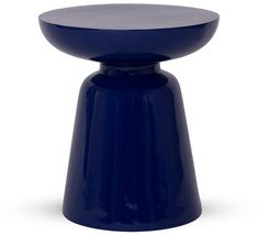 a small blue stool sitting on top of a white floor