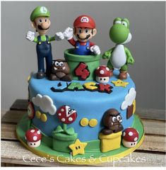 there is a cake with mario and luigi on it