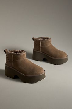 Sheepskin upper, insole Sugarcane EVA sole Pull-on styling Imported | Classic Ultra Mini New Heights Boots by UGG in Brown, Women's, Size: 9, EVA at Anthropologie Ugg Ultra Mini Driftwood, Ugg Classic Ultra Mini Boots, Uggs Classic Ultra Mini Boot, Mini Uggs Dark Brown, Womens Uggs Koolaburra.com, Ugg Classic Ultra Mini, Anthropologie Wedding, Ugg Classic, Eva Sole