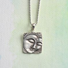 Sterling Silver Buddha Face Necklace #buddhist Spiritual Sterling Silver Hypoallergenic Necklace, Spiritual Hypoallergenic Sterling Silver Necklace, Hypoallergenic Sterling Silver Spiritual Necklace, Sterling Silver Necklace For Meditation, Sterling Silver Symbolic Necklace For Meditation, Symbolic Sterling Silver Necklace For Meditation, Sterling Silver Box Chain Spiritual Necklace, Sterling Silver Box Chain Necklace In Spiritual Style, Spiritual Sterling Silver Square Pendant Necklace