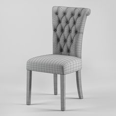 an image of a chair that is made out of wire and fabric with buttons on the back