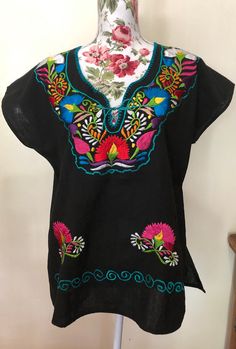 Mexican Embroider Women's Blouse/Tunic. Refer to photos or message me for questions. Length: approx. 25 1/2" Width: approx. 23" Casual Short Sleeve Tunic With Floral Embroidery, Multicolor Bohemian Crew Neck Blouse, Multicolor Bohemian Blouse With Crew Neck, Bohemian Multicolor Crew Neck Blouse, Casual Tunic Tops With Multicolor Embroidery, Casual Multicolor Embroidery Tunic Top, Casual Multicolor Embroidered Tunic Top, Multicolor Folk Style Tops For Beach, Multicolor Folk Tops For Beach