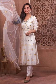 Shop for GEETIKA JAIN White Floral Hand Embroidered Anarkali Set for Women Online at Aza Fashions Transitional White Dress With Zari Work, Festive Off White Chanderi Palazzo Set, Semi-stitched White Dress With Cutdana, Semi-stitched White Dress With Cutdana Details, Bollywood Style White Dress With Cutdana, White Cutdana Dress For Diwali, White Palazzo Set With Gota Work For Eid, White Floor-length Palazzo Set With Chikankari Embroidery, Eid White Palazzo Set With Gota Work