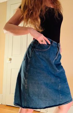 "Vintage 80s denim knee length skirt. Ladies sz 32 Sportelle brand. Flattering, cool, easy to wear knee length denim skirt. Sportelle brand, marked ladies 32.  Waist 30\" Length 23\""