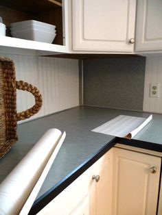 the kitchen counter is clean and ready to be used for cooking or cleaning up some dishes