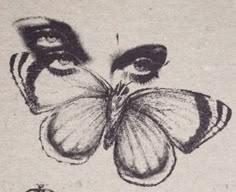 a black and white drawing of a woman's face with a butterfly on it