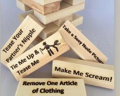 several wooden blocks with words on them that say, remove one article of clothing