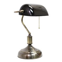 a black and silver desk lamp on a white background