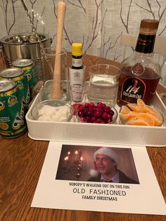 a tray filled with food and drinks sitting on top of a table next to a sign