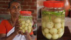 a woman holding a jar full of pickled onions