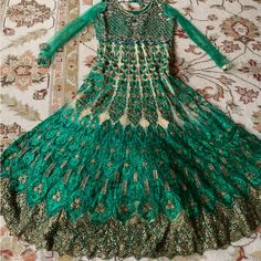 Beautiful Green Anarkali Great For All Occasions Elegant Green Gown For Festivals, Green Bollywood Gown With Dabka Detailing, Green Floor-length Choli With Dabka Detailing, Green Bollywood Long Sharara, Green Bollywood Sharara, Long Green Festive Gown, Festive Long Green Gown, Green Dabka Gown For Diwali, Green Anarkali Long Gown