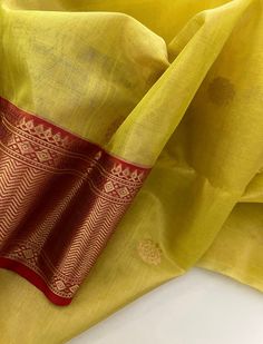 1.this is beautiful pure katan tissue chanderi silk sari with nakshi birder with golden  zari butties all over with running blouse piece 2.this sari is 5.5 mt length 3.this is a very elegant looking beautiful sari for all occasions like weddings and other formal events  4.fall and pico is complimentary  5.blouse can be made as per the requirements of the clients with proper measurements.stitching charges will be extra  6.plz check the availability of the sari before placing the order Silk Sari, Elegant Flowers, Blouse Piece, Stitching, Weaving, Saree, Weddings, Silk, Running