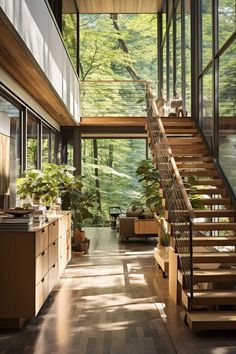 the inside of a house with stairs leading up to it