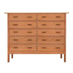 a large wooden dresser with many drawers on it's sides and one drawer in the middle