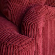 the back end of an upholstered red couch