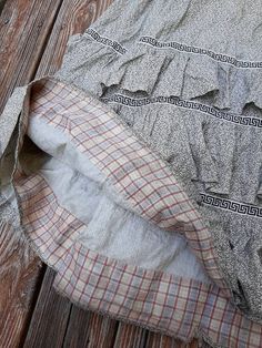 "Antique cotton floral calico everyday work skirt c.1860-70. With tiered ruffle skirt and a striking Greek key ribbon decoration. Inner hem lined in sweet cotton plaid. Side pocket. Fixed waistband with milk glass button. Good wearable antique condition. Expected signs of wear and age. There are faint marks and discoloration to the skirt. A few very small holes. There are some holes near the waistband and some rough inner stitching. Hole behind the button. Waist 25\" max Length 39\"" Peasant Cotton Skirt With Ruffles, Cotton Gingham Skirt With Ruffles, Cottagecore Cotton Skirt With Ruffles, Vintage Cotton Ruffle Skirt, Vintage Ruffled Cotton Skirt, Vintage Cotton Skirt With Ruffles, Plaid Ruffled Cotton Skirt, Plaid Cotton Skirt With Ruffles, Vintage Plaid Cotton Skirt