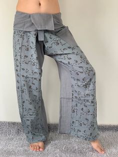 "Unisex Thai fisherman pants. One size fits all. You can wear in many occasions, casual wear, yoga wear, relax at home, travel etc. If you are looking for some pants that you can wear everywhere, comfortable, relax and Easy to wear. Thai fisherman pants is Answer!! Nice gift for yourself or your lover One pocket on the side for storing your items such as wallets, mobile phones, etc Approx. Measurements: One size can fits most and 1 Pockets Waist around 51\" (Wrap Pants) Length 45\" Lower Leg 14\ Cotton Yoga Pants With Relaxed Fit, Bohemian Cotton Wide Leg Yoga Pants, Bohemian Wide Leg Cotton Yoga Pants, Relaxed Fit Full Length Cotton Yoga Pants, Cotton Yoga Pants For Meditation, Cotton Wide Leg Yoga Pants With Relaxed Fit, Comfortable Cotton Wide-leg Yoga Pants, Comfortable Wide-leg Cotton Yoga Pants, Traditional Cotton Bottoms For Meditation