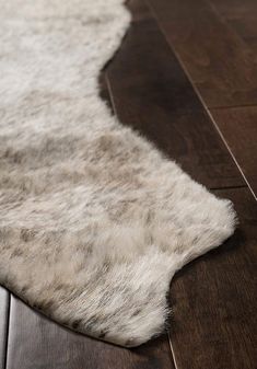 an animal skin rug is on the floor