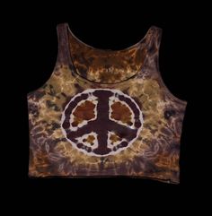 Peace sign tie dye crop tank MADE TO ORDER -product will differ slightly than the photo shown as no one tie dye is the same -100% cotton -made with professional procion dyes Brown Sleeveless Hippie Top, Brown Hippie Festival Tops, Brown Cropped Cotton Tank Top, Cropped Brown Cotton Tank Top, Brown Cotton Crop Top Tank Top, Bohemian Tie-dye Cotton Crop Top, Bohemian Cotton Tie-dye Crop Top, Bohemian Brown Cotton Crop Top, Casual Brown Tank Top For Festival