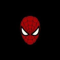 the face of spider - man with eyes wide open and glowing in the dark background