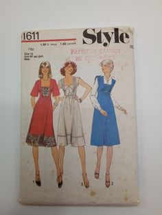 Style 1611 1976 34" Bust Misses' Dress or Pinafore: High-waisted dress or pinafore with front panelled bodice has shaped lowered neckline, back zipper and short set-in sleeves. View 1 has bodice front and lower skirt in contrasting y. View 2 has quilted bodice front and sleeves and toggle trim. View 3 has self fabric ties and trim. Complete  Skirt Front, Skirt Back have been cut for View 1. All pieces are present  Envelope has wear and tear Mode Queer, Pinafore Dress Pattern, Vintage Sundress, Square Neckline Dress, Sundress Pattern, 1970s Sewing Patterns, Queer Fashion, Miss Dress, Couture Vintage