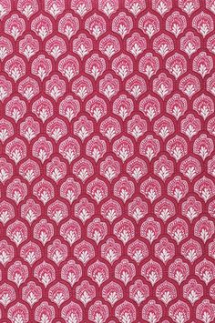 a red and white pattern on fabric