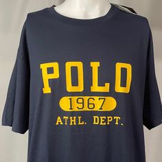 Brand New With Tags! Smoke And Pet Free Home Polo By Ralph Lauren Crewneck Graphic T-Shirt Navy T-Shirt With Yellow-Gold Printed Graphic Men’s Size 1xb // Xl Big 100% Cotton Thanks For Checking It Out! I Ship Every Single Business Day! Navy Short Sleeve Top With Letter Print, Navy Crew Neck Tops With Text Print, Navy Logo Print Crew Neck Top, Classic Blue T-shirt With Letter Print, Navy Crew Neck Top With Logo Print, Casual Navy Shirt With Letter Print, Classic Blue Tops With Letter Print, Ralph Lauren Crewneck, Ralph Lauren Tshirt