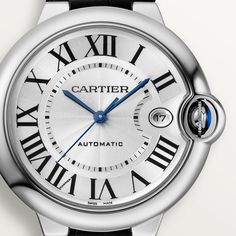 Stainless steel Cartier Ballon Bleu automatic watch featuring a silver Roman dial with a high polished bezel and case. The watch case is 40mm and is attached to a black leather strap. Modern White Cartier Watch, White Cartier Automatic Watch, White Gold Leather Watch With Polished Finish, Cartier Black Chronometer Watch Accessories, Cartier Leather Watch With Subdials, Elegant Cartier Leather Watches, Luxury Silver Cartier Watch, Modern Cartier Automatic Watch, White Cartier Watch With Date Indicator