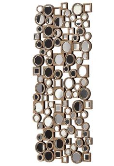 a decorative wall hanging made out of mirrors on a white background with the letter i in it's center surrounded by smaller round and rectangles