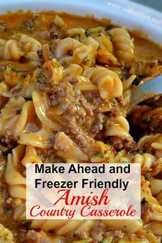 a white bowl filled with pasta and meat next to a red sign that reads make ahead and freeze friendly amish country casserole