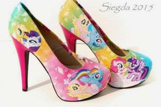 a pair of high heels painted with cartoon characters