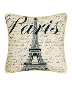 a pillow with the eiffel tower on it