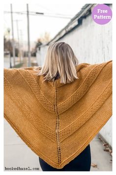 a woman wearing a yellow knitted shawl with the words free pattern on it