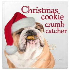 a bulldog wearing a santa claus hat with the words christmas cookie crumb catcher