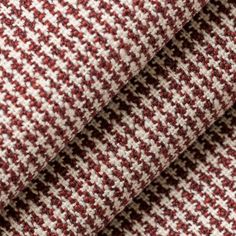 red and white checkered fabric close up on a piece of clothing or apparel material