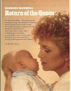 a woman holding a baby in her arms with the caption return of the queen