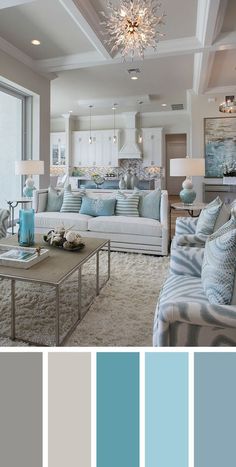 a living room filled with lots of furniture and blue accents in shades of gray, beige, and white