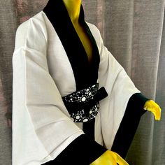 Men’s Short Modern Yukata By Lugado Atelier. It’s Made Of Cotton Linen And Black Velvet. It Does Include A Hand Crafted Velvet, Guipur And Vinyl Adjustable Belt. One Size Fits All. The Measurements Are , Sleeves 26 Inches Long . Back Side Width 26 Inches , Long Width 27 Inches . Modern Yukata, Men's Yukata, Linen Men, Adjustable Belt, Kimonos, Black Velvet, Mens Suits, Cotton Linen, Blazer Suit