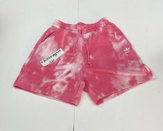 Adidas Originals French Terry Tie Dye Boyfriend Shorts Color: Pink/White Tagged Size: Women's L (Check Measurements) Retail: $40 100% Authentic Guaranteed Actual Measurements: Waist: 26" unstretched Hips: 41" Rise: 12.5" Inseam: 6" Leg Opening: 14" Details: BOYFRIEND SHORTS TIE-DYE SHORTS WITH A LONGER, CASUAL SHAPE. These adidas shorts have that perfect boyfriend fit: Casual, easy and comfortable. Plus they're made in soft French terry. A tie-dye effect leans even more into the laid-back vibe. Perfect Boyfriend, Rose Tone, Boyfriend Shorts, Adidas Shorts, Tie Dye Shorts, Fleece Shorts, Active Wear Shorts, Boyfriend Fit, French Terry