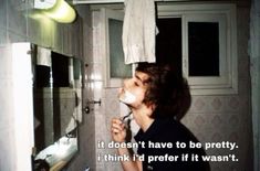 a young man shaving his teeth in the bathroom with a quote on it that reads, it doesn't have to be pretty i think i prefer if it was it