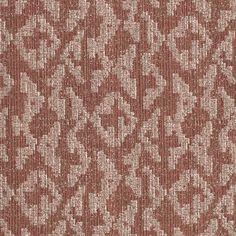 a brown and white pattern on fabric