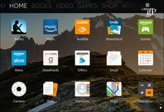 the home screen of a tablet with various apps on it and an image of mountains in the background
